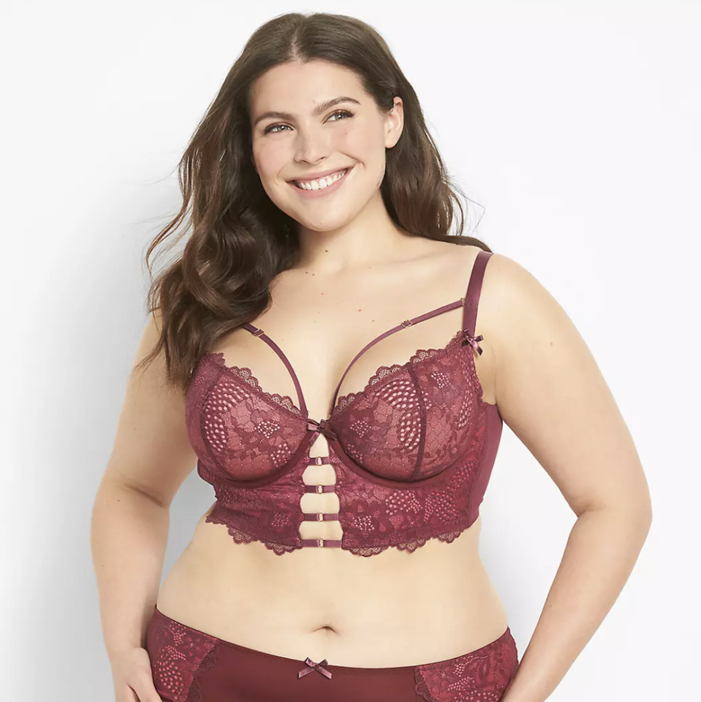 Good Bodies' Amazing Places for Plus-Size Lingerie - Cacique Maroon Longline Bralette with straps and lace on model with brown hair